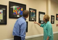 Jeff Herron of Bowling Green Independent and Joy Campbell of Danville Independent, two recent guests at KSBA for a meeting of members of the Kentucky Association of School Business Officials, were among the first outsiders to check out the display. The plan is for the works of art to be changed out over time, so new pieces may be viewed.