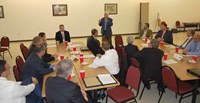 Rep. Lynn Belcher (R-Marion - standing) reacted to some of the priority issues laid out in the group discussion. Belcher, a retired engineer and volunteer in the Crittenden County High School Crosswalk Learning Center, quizzed superintendents about the impact of regulatory actions coming out of Frankfort.