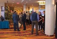 Attendees check out vendor exhibits between clinic sessions. Twenty companies that provide services to Kentucky school districts set up booths for the event.