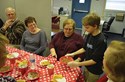 Fourth-grader Jason Hodges serves taco soup to, from left, Ashland school board member Charlie Chatfield, district support Jessie Singleton, student services director Lisa Henson and district consultant Janice Ledford.