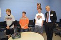 Anderson County Judge-Executive Orbrey Gritton stands with students during a presentation by the high school’s robotics team. During the tour, visitors also witnessed a civil engineering design demonstration, a culinary class studying food nutrition and preparations for the annual plant sale at the school’s greenhouse.
