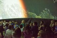 Mixing projected images with stellar diagrams backed by electronic music, one of the show’s many “Wow!” moments was the passage of dawn over the earth. 

In its third year, the mobile planetarium will visit more than 60 schools this year, up from just 20 in its inaugural tour.