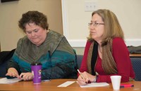 Kentucky Education Association Executive Director Mary Ann Blankenship (left) and Lynne Slone, legal counsel for the Kentucky Association of School Councils, take notes as OSBA’s director of legislative services Damon Asbury and Sara Clark, the association’s director of legal services, detail recent reform law passed to address numerous problems involving charter schools operating in Ohio.