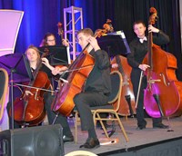 The Fort Thomas Highlands High School Chamber Orchestra performs during the conference’s opening session Friday.