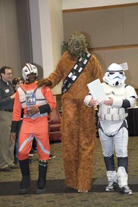 Just like a regular school spelling bee, a formal list of words is used by the pronouncer and judges. For this event, a special squad of Star Wars characters guarded and delivered the binder at the opening of the event, which has raised more than $93,000 to boost after-school services for special needs students.