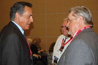 Taylor County Schools Superintendent Roger Cook (right) is quizzed by Dan Domenech, executive director of the American Association of School Administrators after Cook’s session on self-paced student learning.