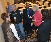 Mimi Becker, the executive director of the Arts Commission of Danville/Boyle County, interacts with attendees during a clinic session at the conference.