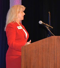 KSBA Associate Executive Director welcomes attendees during the opening session of the annual conference.