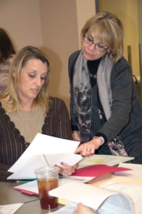 Tumolo-Wash works with Oldham County Schools’ speech language pathologist Lori Pyle during a training on meeting Medicaid records-keeping rules. KSBA provides technical guidance for directors of special education and support staff who must file the reports within those rules for districts to recoup their expenses.