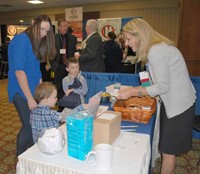 Ginny Watkins and sons Brooks (left) and Brandt made the rounds of the Exhibit Hall, visiting the Pa