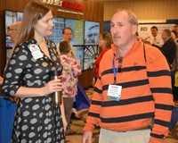 Stacey McChord of RossTarrant Architects talks to Anderson County board member James Sargent during 