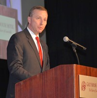 Bullitt County Superintendent Keith Davis speaks to the crowd after receiving the F.L. Dupree Award 