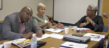 Christian County school board member Susan Hayes makes a comment as KSBA’s new Equity Cadre holds its first meeting; at left is EKU assistant professor Roger Cleveland and at right is Jacqueline Pope-Tarrence, the group’s chair.