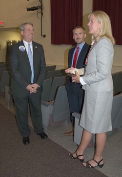 From left, state Sen. Dorsey Ridley, a Henderson Democrat, talks with KSBA Governmental Relations Director Eric Kennedy and Henderson County Schools Superintendent Marganna Stanley prior to the start of a school district-hosted forum on pension reform.