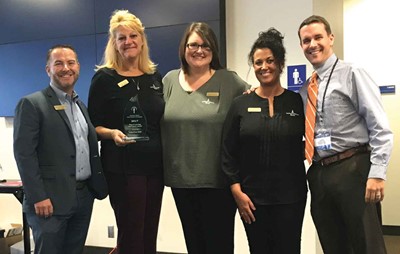 KYSPRA awarded its 2017 Flag of Learning and Liberty to Independence Bank of Owensboro, nominated by the Owensboro Independent school district, whose public information officer, Dave Kirk, is at far right in photo with bank representatives.