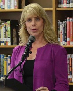 KSBA Executive Director Kerri Schelling speaks about the Shared Responsibility Plan at a press conference held Nov. 6 at Woodford County High School.