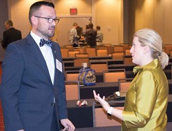 KSBA staff attorney Whitney Crowe talks with Shelby County school board member Will Barnett after her clinic session – An Introduction to Kentucky’s Charter School Laws – during KSBA’s Winter Symposium.