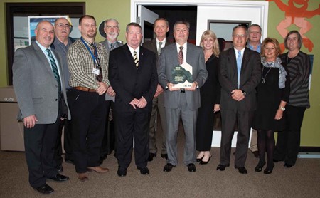 KSBA President David Webster and Executive Director Kerri Schelling presented the PEAK Award to the Carroll, Gallatin, Henry, Owen and Trimble county school districts.