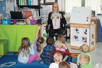 Students work on a math lesson during Bridget Gay’s kindergarten class at Ezra B. Sparrow Early Childhood Center in Anderson County. The school uses the Kagan Cooperative Learning Structures, which won the district the PEAK Award in 2007.