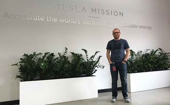 Estill County High School alumnus Kevin Haney in the Tesla Inc. offices in San Francisco, where he is a team member on the technology help desk. (Photo submitted)