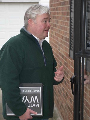 Elizabethtown Independent school board member Matt Wyatt talks to a voter as he campaigns for state representive.