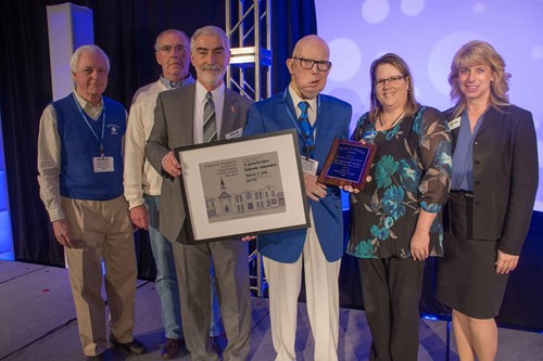 Paintsville Independent school board member Ken Fuller, fourth from left, received the 2018 Warren Proudfoot Award for Outstanding School Board Member March 3 during KSBA's annual conference.