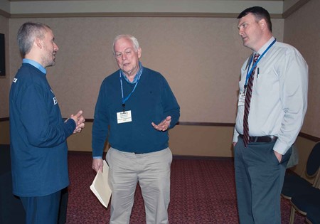 KSBA Governmental Relations Director Eric Kennedy, left, talks with Pineville Independent school board Chairman James Golden (center) and Pineville Independent Superintendent Russell Thompson following his legislative update at KSBA’s annual conference.