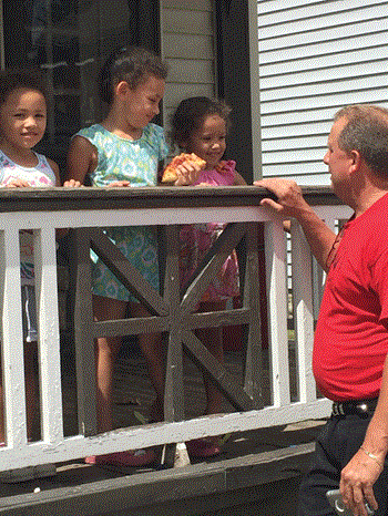 Newport Independent Superintendent Kelly Middleton talks to students during a home visit prior to the school year beginning. (Photo courtesy of Newport Independent Schools)