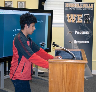 Russellville Independent High School senior Luis Pacheco-Ramirez delivers his panel review presentation at the board of education office in early May.