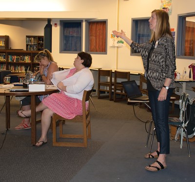 Frankfort Independent Schools social worker Marci Fritts explains to district staff during a summer training how they can use trauma-informed care in the classroom and school building.