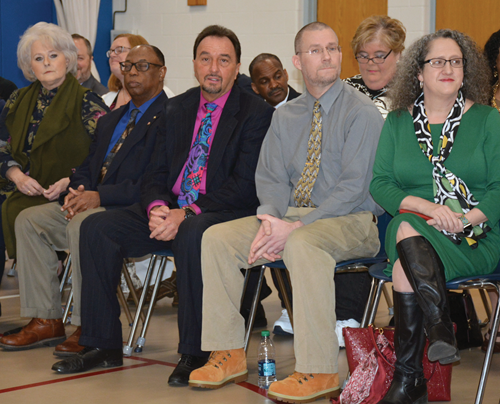 The Franklin County Board of Education watches as fifth-grade teacher Angie Beavin receives the Milken Educator Award. The board members were not told about the award in advance.